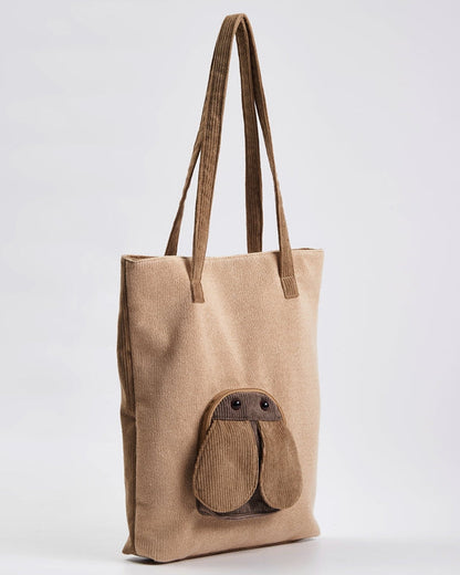 Three-quarter view of the beige Fly tote bag
